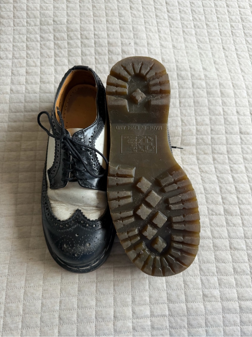 Dr. Martens Black and White Wingtip Loafers